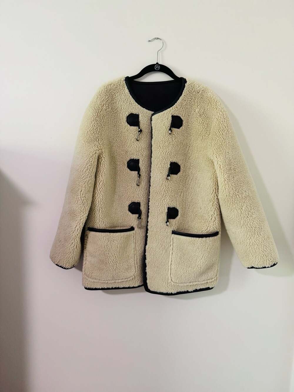 Dunst Collarless Buckled Shearling Jacket